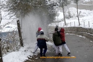 Children playing with snow.